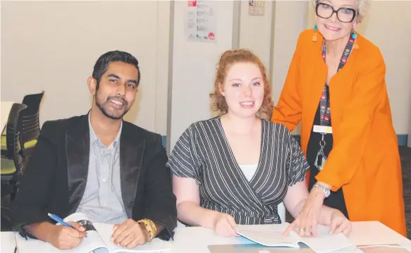  ??  ?? Shiv Kumar, Erin Saunders and TAFE Queensland Gold Coast Diploma of Legal Services teacher, Marilyn Davis.