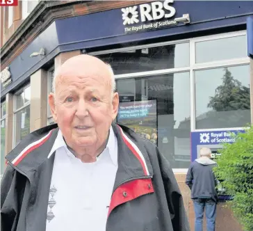  ??  ?? Anger Businessma­n Alex Robertson, 83, is a regular user of the bank