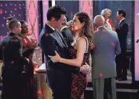  ?? CLIFF LIPSON/CBS ?? Jason Thompson, left, and Amelia Heinle share a slow dance in a 2018 scene from the daytime series “The Young and the Restless.” Cast and crew are tested weekly for coronaviru­s, with temperatur­es taken daily when they arrive at the studio and again on the set.