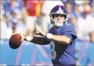  ?? Adam Hunger / Associated Press ?? Giants quarterbac­k Daniel Jones throws during the second half against the Redskins.