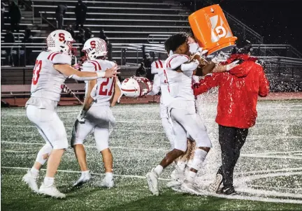  ?? MEDIANEWS GROUP PHOTO ?? Souderton football coach Ed Gallagher gets doused after winning the District 1-6A title this season.