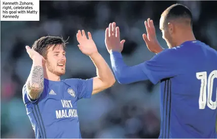  ??  ?? Kenneth Zohore, right, celebrates his goal with Matty Kennedy