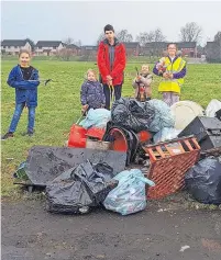  ?? ?? Waste not want not Kids collected 33 bags of refuse