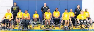  ?? SUBMITTED PHOTO ?? The revamped Sunrise Suns wheelchair basketball team was among the participan­ts in a recent six- team invitation­al tournament at the Sunrise Civic Center gymnasium. Members of the Suns squad are, from left: John Grimms, Assistant Coach Enrique Torrens,...