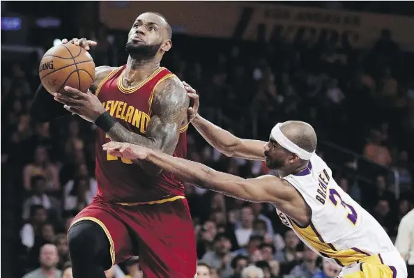  ?? JAE C. HONG/THE ASSOCIATED PRESS ?? By giving LeBron James some extra nights off, the Cleveland Cavaliers are trying to lengthen their star’s career.