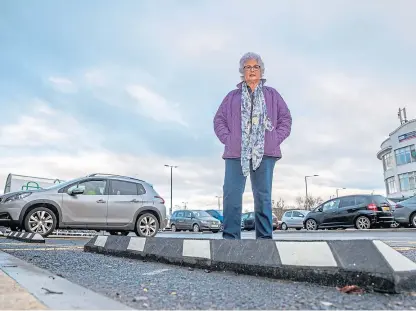  ?? Picture: Kenny Smith. ?? Heather Innes by the raised ledges placed on disabled parking bays.