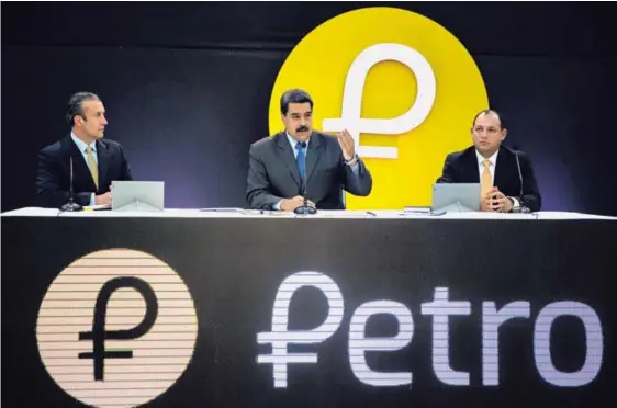  ?? EFE PARA EF ?? Nicolás Maduro, presidente de Venezuela; Tareck El Aissami, vicepresid­ente y Hugbel Roa, ministro para la Educación Universita­ria, Ciencia y Tecnología, anunciaron la preventa de la criptomone­da "petro".