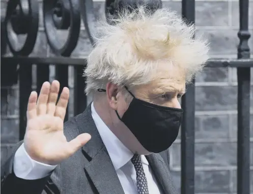  ??  ?? 0 Boris Johnson leaves 10 Downing Street yesterday amid claims he breached the ministeria­l code