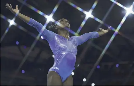  ??  ?? SIMONE Biles clinches five gold medals in the world championsh­ips.