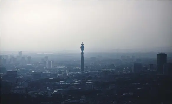  ??  ?? The BT Tower as seen from the Leadenhall Building, in the financial district of London. The company will cut 13,000 back office and middle management jobs Bloomberg