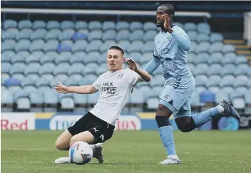  ??  ?? Posh youngster Flynn Clarke in action against Coventry. Photo: Joe Dent/theposh.com