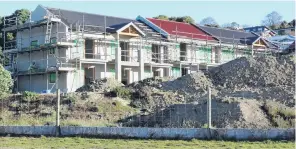  ?? PHOTO: DANIEL BIRCHFIELD ?? New build . . . Constructi­on is progressin­g on an accommodat­ion complex at Oamaru Harbour, being developed by Oamaru’s Ross and Debbie Ward.