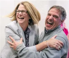  ?? RICHARD LAM ?? City of North Vancouver mayor-elect Linda Buchanan celebrates her victory with outgoing mayor Darrell Mussatto on Saturday after beating her nearest rival Guy Heywood by 401 votes.