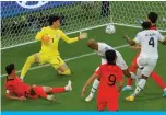  ?? ?? AL-RAYYAN: Ghana’s defender #04 Mohammed Salisu (right) scores his team’s first goal during the Qatar 2022 World Cup Group H football match between South Korea and Ghana on November 28, 2022. — AFP