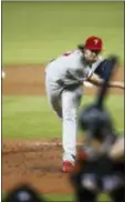  ?? BRYNN ANDERSON — THE ASSOCIATED PRESS ?? Phillies pitcher Aaron Nola settled down after a rough first inning, but the offense never came around against the Miami Marlins Saturday.