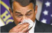  ?? Steve Helber / Associated Press ?? House Speaker John Boehner, R-Ohio, wipes away tears after announcing his resignatio­n.