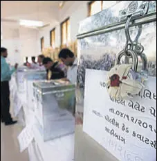  ?? REUTERS FILE ?? Sealed ballot boxes inside a polling centre in Gujarat.