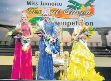  ?? Photos by Shorn Hector/Photograph­er ?? Khamara Wright (centre), Miss Jamaica Festival Queen 2019, is flanked by first runnerup Annakay Hudson (left), Miss Kingston & St Andrew; and second runner-up Chardonnae Parkins, Miss St James, at the Miss Jamaica Festival Queen Competitio­n held at the National Arena on Thursday, August 1.