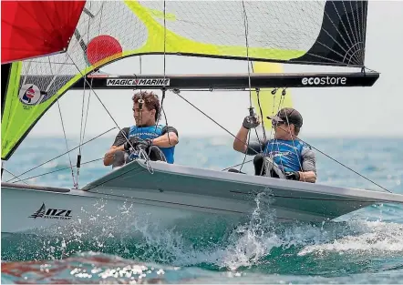  ?? SAILING ENERGY ?? Kiwi stars Blair Tuke, left, and Peter Burling are all concentrat­ion during the 49ers world championsh­ips in Auckland yesterday.