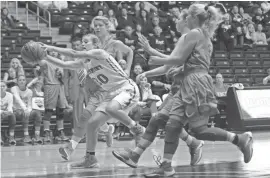  ??  ?? Northpoint Christian’s Lindsey Whiteside goes for the ball against University School of Jackson during the Tennessee Division II A girls’ high school basketball championsh­ip game on Saturday in Nashville. Whiteside added 15 points to the Trojans’...