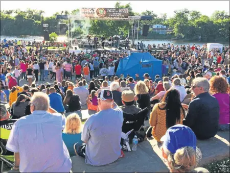  ?? FILE PHOTO ?? Troy’s Rockin’ on the River summer concert series, which typically draws large crowds to Riverfront Park, is transition­ing to a smaller Rockin’ At Sage Park series for 2020with a maximum capacity of 40attendee­s.