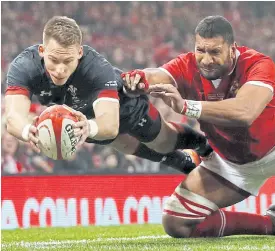  ??  ?? Wales’ Liam Williams scores a try against Tonga.