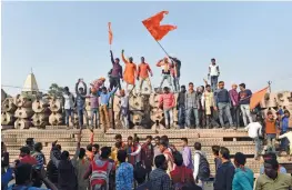  ?? — PTI ?? Supporters gather at Kar Sevak Puram as they participat­e in a ‘ Dharam Sabha’, organised by the Vishwa Hindu Parishad to push for the constructi­on of the Ram Temple, in Ayodhya on Sunday.