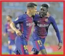  ??  ?? Coutinho y Dembélé.