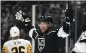  ?? MARK J. TERRILL — THE ASSOCIATED PRESS ?? Adrian Kempe celebrates after scoring one of his four goals Saturday in the Kings' 6-0victory over the Penguins.