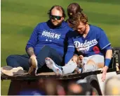  ?? Tribune News Service ?? Los Angeles Dodgers’ Gavin Lux is carted off the field after getting injured running to third base against the San Diego Padres during a spring training game on Monday, Feb. 27, 2023, in Peoria, Arizona.