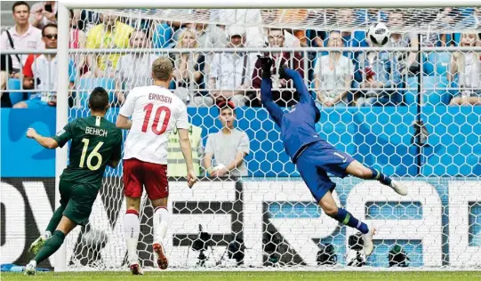  ?? AP/PTI ?? Denmark’s Christian Eriksen (second left) scores the opening goal during the group C match between Denmark and Australia in the Samara Arena on Thursday