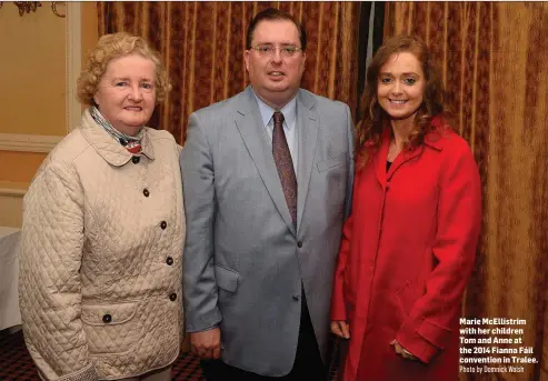  ?? Photo by Domnick Walsh ?? Marie McEllistri­m with her children Tom and Anne at the 2014 Fianna Fáil convention in Tralee.