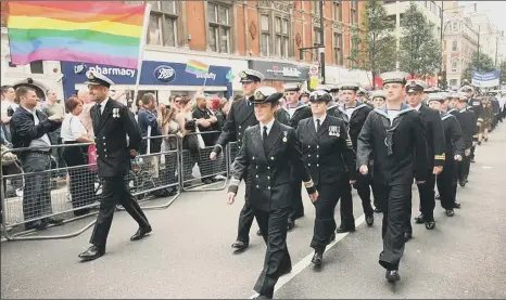  ?? ?? INDEPENDEN­T REVIEW
Military personnel take part in the Gay Pride parade in London