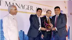  ??  ?? Senior Vice President Group HR Paduma Subasinghe accepting the Company with Great Manager Award on behalf of Brown & Company