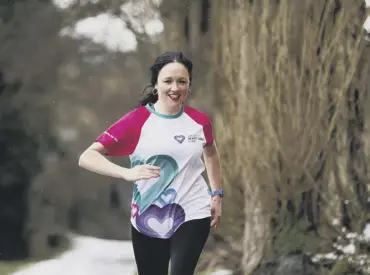  ??  ?? LOVING RUNNING: Kelly Galvin will jog 14 miles to help the Children’s Heart Surgery Fund