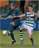  ??  ?? Key signing…midfielder Ronan Finn (R) competes with Theo Hernandez of Milan