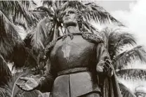 ?? Lynne Sladky / Associated Press ?? A statue of Christophe­r Columbus stands vandalized Thursday at Bayfront Park in Miami.