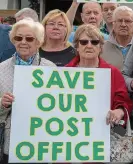  ??  ?? target: Dodsboro locals on Friday protesting over the closure