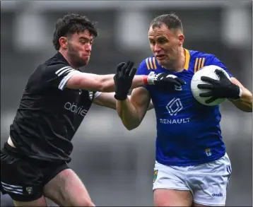  ?? ?? Wicklow’s Dean Healy in action against Luke Towey of Sligo during the Allianz Football League Division 4 final at Croke Park.