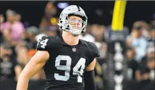  ?? Rick Scuteri Associated Press ?? A WIN for the Raiders felt like victory for generation­s of gay players, thanks to Carl Nassib.