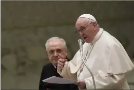  ?? ALESSANDRA TARANTINO — THE ASSOCIATED PRESS ?? Pope Francis delivers a Christmas speech during an audience with the Vatican’s employees at the Vatican on Thursday.