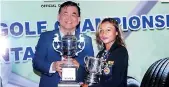  ??  ?? President Sri Lanka Golf Union -Chief Marshal (Rtd) Harsha Abeywickre­ma presents the award to Men’s winner Chanaka Perera (L) while Taniya Minel Balasuriya receives the Ladies award from Choong Kee Seng – Director Sales APAC Continenta­l Tyres.