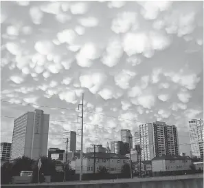  ?? VIA AP ?? Mammatus clouds glow after storms hit Tulsa, Okla.