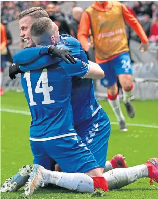  ?? Picture: AP. ?? Ryan Kent, left, celebrates with Florian Kamberi after scoring the opening goal.