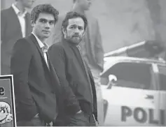  ?? DIYAH PERA, CW ?? KJ Apa is Archie and Luke Perry is his dad, Fred, in a gritty new take on the comic book high schooler.