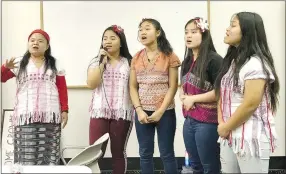  ?? SALLY CARROLL/MCDONALD COUNTY PRESS ?? A singing group from Myanmar entertaine­d members of the Back To Basics Group during a recent meeting. The monthly meetings feature a potluck, guest speaker and entertainm­ent and are open to the public. The group meets at New Mac Electric in Anderson.