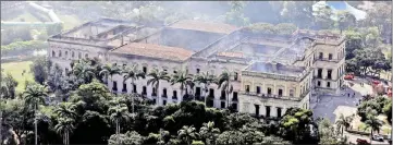  ??  ?? An aerial view of the National Museum of Brazil after a fire burnt it in Rio de Janeiro, Brazil. — Reuters photo