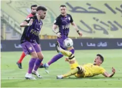  ?? Supplied picture ?? ↑ Players of Al Ain and Al Wasl in action during their Arabian Gulf League match on Friday.