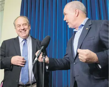  ??  ?? Andrew Weaver, left, leader of the B.C. Green party, and NDP Leader John Horgan hold a press conference at the B.C. legislatur­e last week. Although Weaver’s alliance with the NDP has angered some Green supporters, it’s a practical compromise, writes...