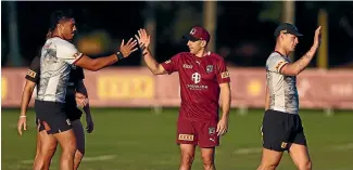  ?? GETTY IMAGES ?? Queensland’s rookie coach Billy Slater, centre, is one win away from sealing State of Origin bragging rights over New South Wales.